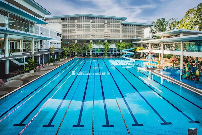 An outdoor swimming pool with lanes